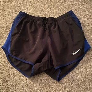 Navy blue and black Nike shorts